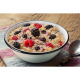 Lightweight Rice-coconut porridge with forest fruits